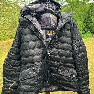 Barbour quilted black winter jacket with classic Barbour tartan lining. Size 10